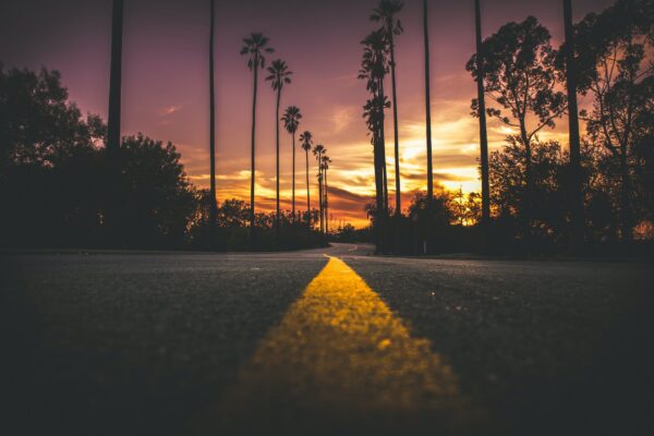 road in city during sunset